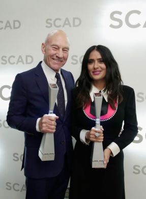 Actors Patrick Stewart and Salma Hayek with awards during the 20th Anniversary SCAD Savannah Film Festival