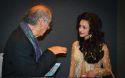 . Sikandar Sinha gestures hypnotically during discussion with enchanted actress Madhuri Bhattacharya